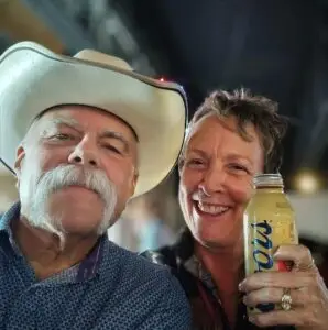 Elderly couple enjoying pizza at Big Sal’s Pizzeria & Restaurant