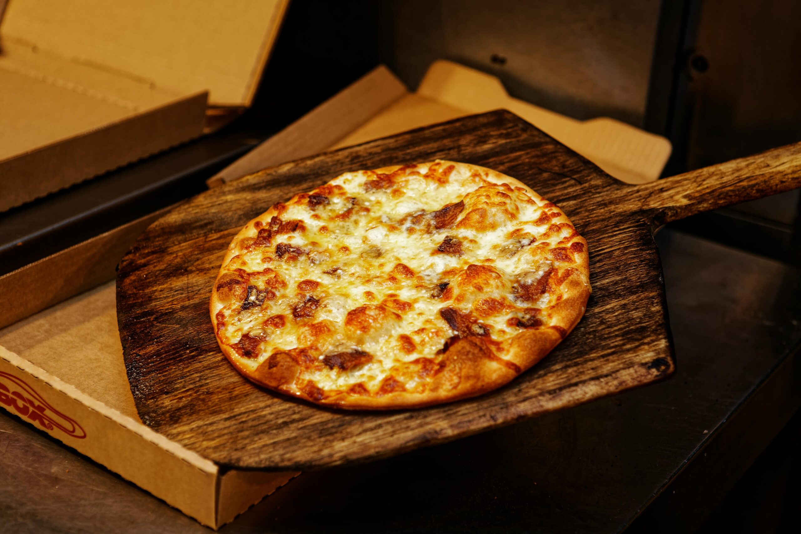 Big Sal's hand-tossed pizza fresh from the oven